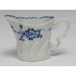 A Liverpool High Chelsea ewer, painted in underglaze blue with flowers, in relief with ferns, 8cm