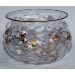 An Art Nouveau period glass bowl, decorated in gilt with blossoming branches, 19cm diam, c.1910
