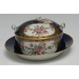 A Worcester butter tub cover and stand, of circular shape, painted with flower surrounded by an