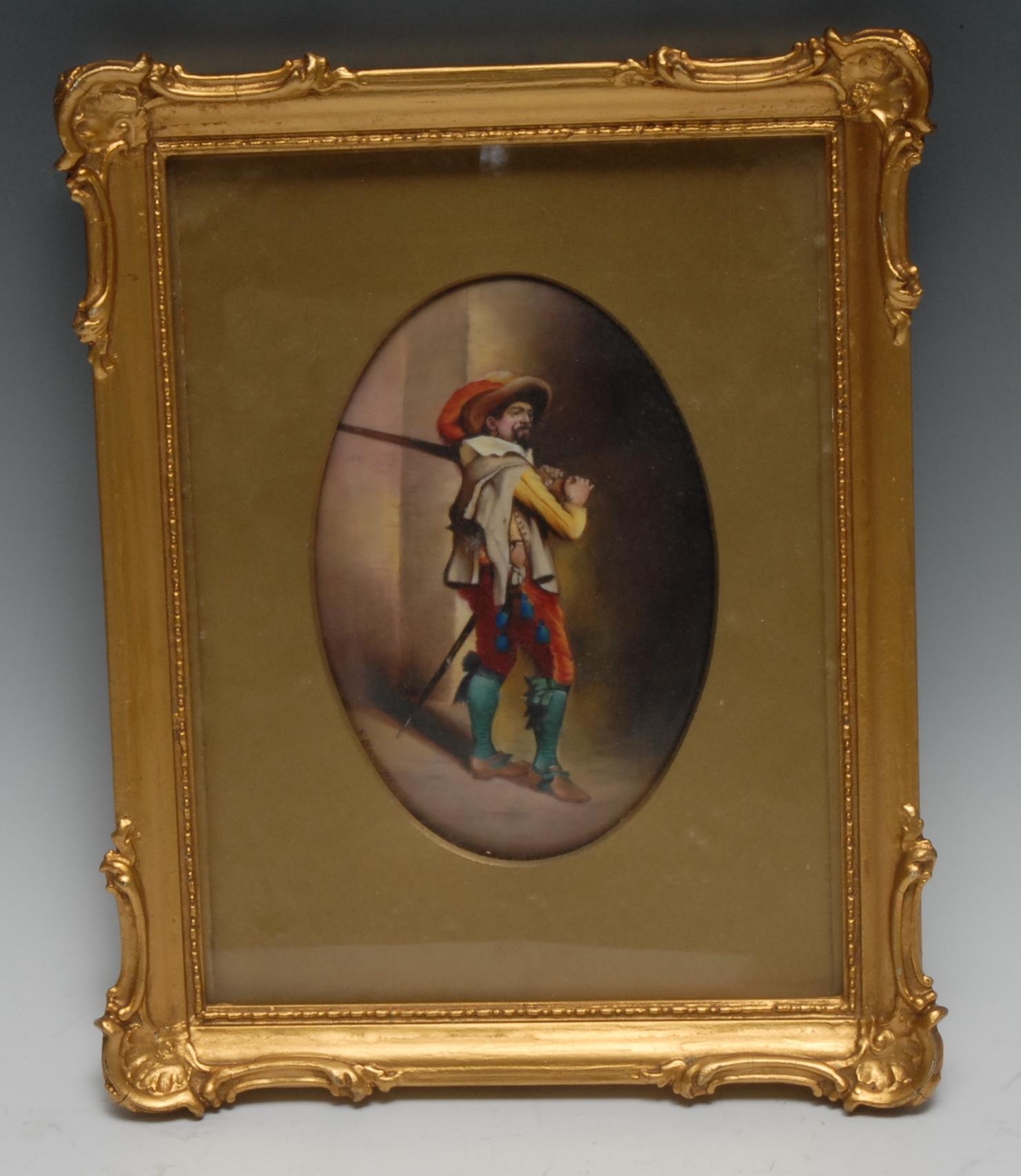 A 20th century Paragon porcelain plaque, painted by F. Micklewright, signed, with a Musketeer,