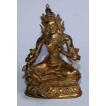 A 19th century gilt bronze Tara Buddha, typically seated with her right foot resting on a lotus