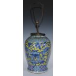 A large Chinese baluster vase, painted in tones of blue and puce with dragons on a yellow ground,