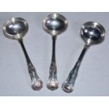 A set of three Victorian silver King's pattern sauce ladles, 18.5cm long, John Round & Sons,