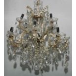 A glass twelve light electrolier, faceted glass droplets and beads, 70cm high to fitting