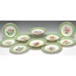 A Copeland Botanical dessert service, well painted with flowers, apple green rim, gilt dentil rim,