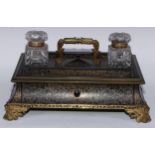 A 19th century ebony and brass Boulle country house standish of large proportions, the central lotus
