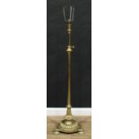 A late 19th century brass telescopic standard lamp, lotus sconce, fluted pillar, domed base, 121cm