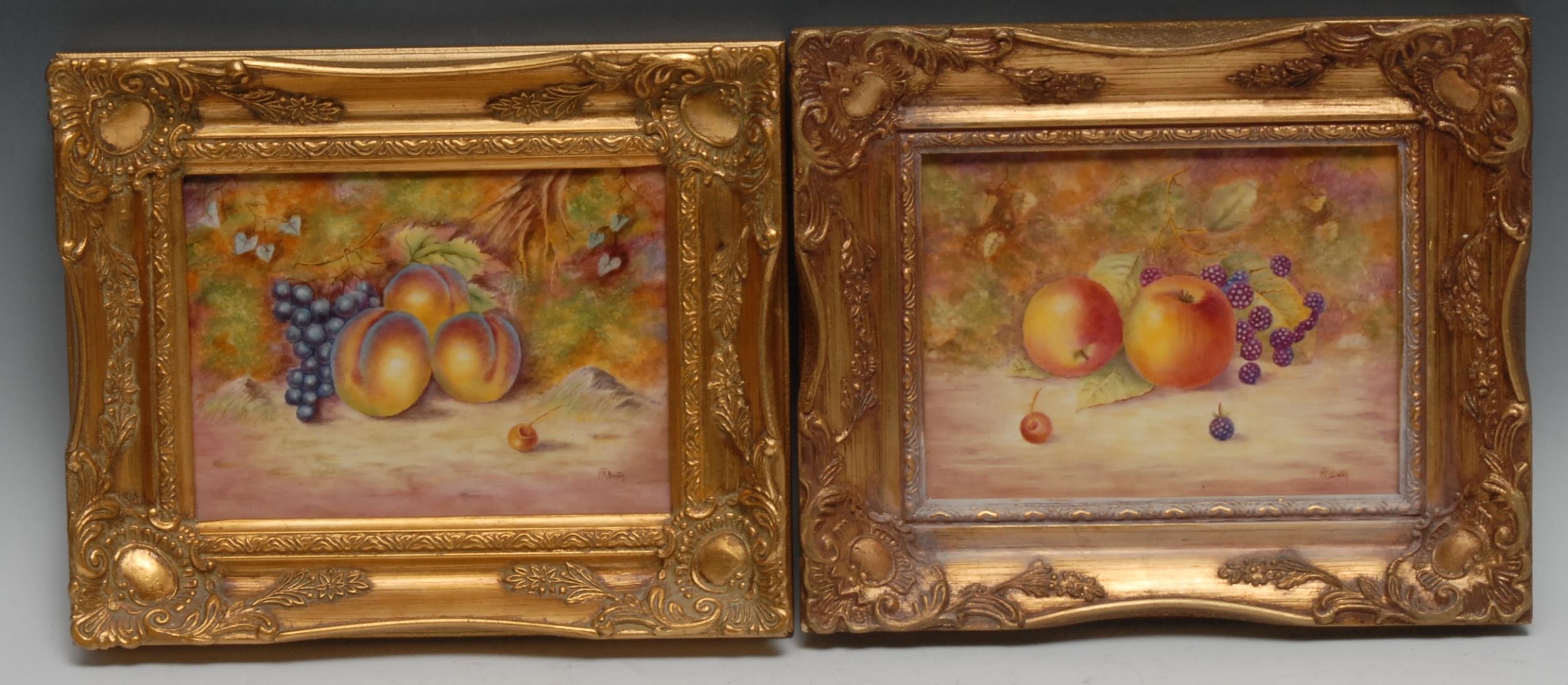 A pair of English porcelain rectangular plaques, painted by Ernest R. Booth, signed, with ripe fruit