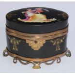 A 19th century French gilt metal mounted porcelain shaped oval table casket, painted in polychrome