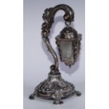 A Portuguese silver table lamp, as a lantern and post, chased throughout with scrolls and foliage,