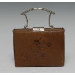 A 19th century Aesthetic Movement tooled leather bag shaped sewing companion, silvered faux bamboo