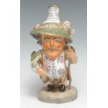 A Royal Crown Derby Mansion House dwarf, richly attired in 17th century cavalier costume,