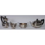 A George V four-piece boat shaped tea service, gadrooned rim, London 1921, 1035g, 33ozt