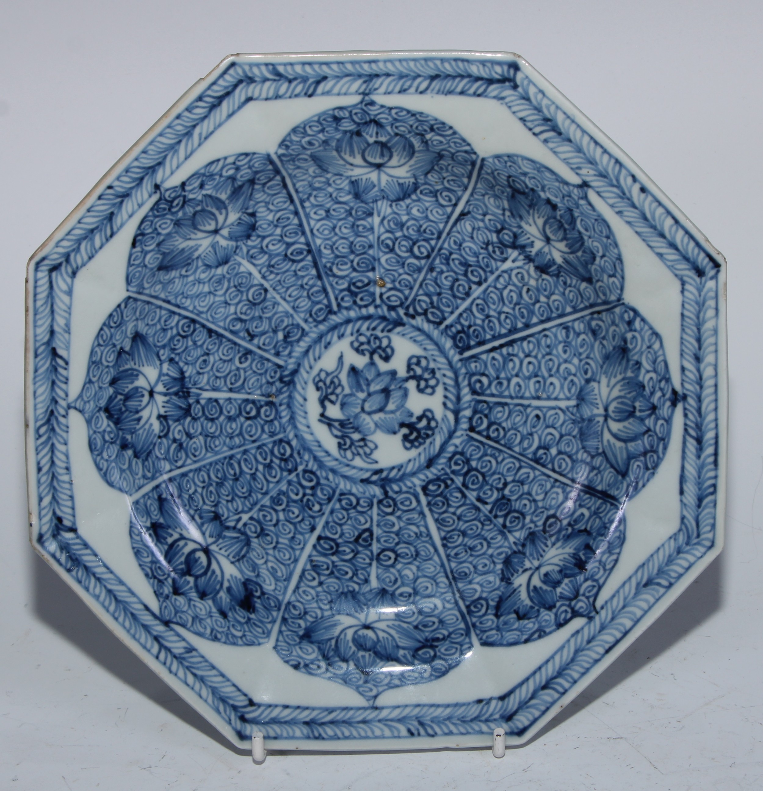 A Chinese octagonal plate, painted in tones of underglaze blue with lotus, 20cm diameter, 18th - Image 2 of 20