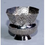 An 18th century Russian silver octagonal vodka tot, half-fluted and engraved with strapwork and