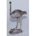 A South African silver novelty model, of an emu, by Afrisilver, modelled standing, above a clutch of