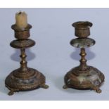 A pair of 19th century gilt bronze and marble candlesticks, cast with fruiting vine and bands of