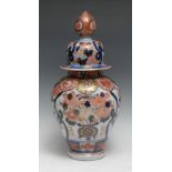 A Japanese porcelain ovoid jar and cover, painted in the Imari palette and picked out in gilt,
