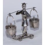 A Chinese silver novelty condiment cruet, as an attendant carrying baskets on a beam, trolley