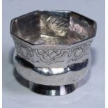 An 18th century Russian silver octagonal vodka tot, half-fluted and engraved with alternating panels