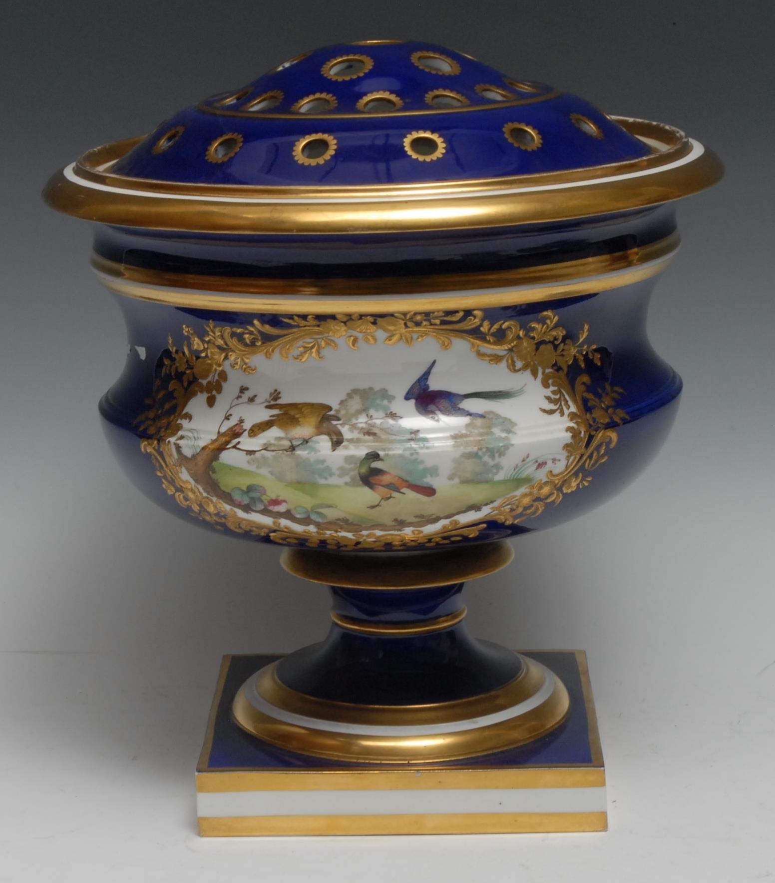 An English porcelain pedestal pot pourri urn, probably Coalport, of Sèvres inspiration, painted in