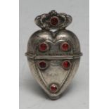 A 19th century South European silver nutmeg grater, as a crowned heart, the hinged cover enclosing a