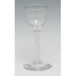 A George III opaque twist wine glass, double-helix stem, domed foot, 14.5cm high, c.1765