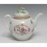 A Worcester teapot and cover, painted in Chinese export style with flowers in an oval panel,