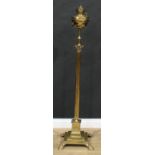 An early 20th century brass Corinthian column standard oil lamp, fluted pillar, stepped square base,