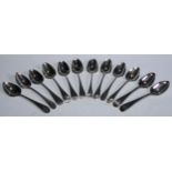 A composed set of twelve silver Old English pattern table spoons, Peter and Anne Bateman and other