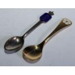 Georg Jensen - a Danish silver-gilt and enamel spoon, 14.5cm long, import marks for London 1970;