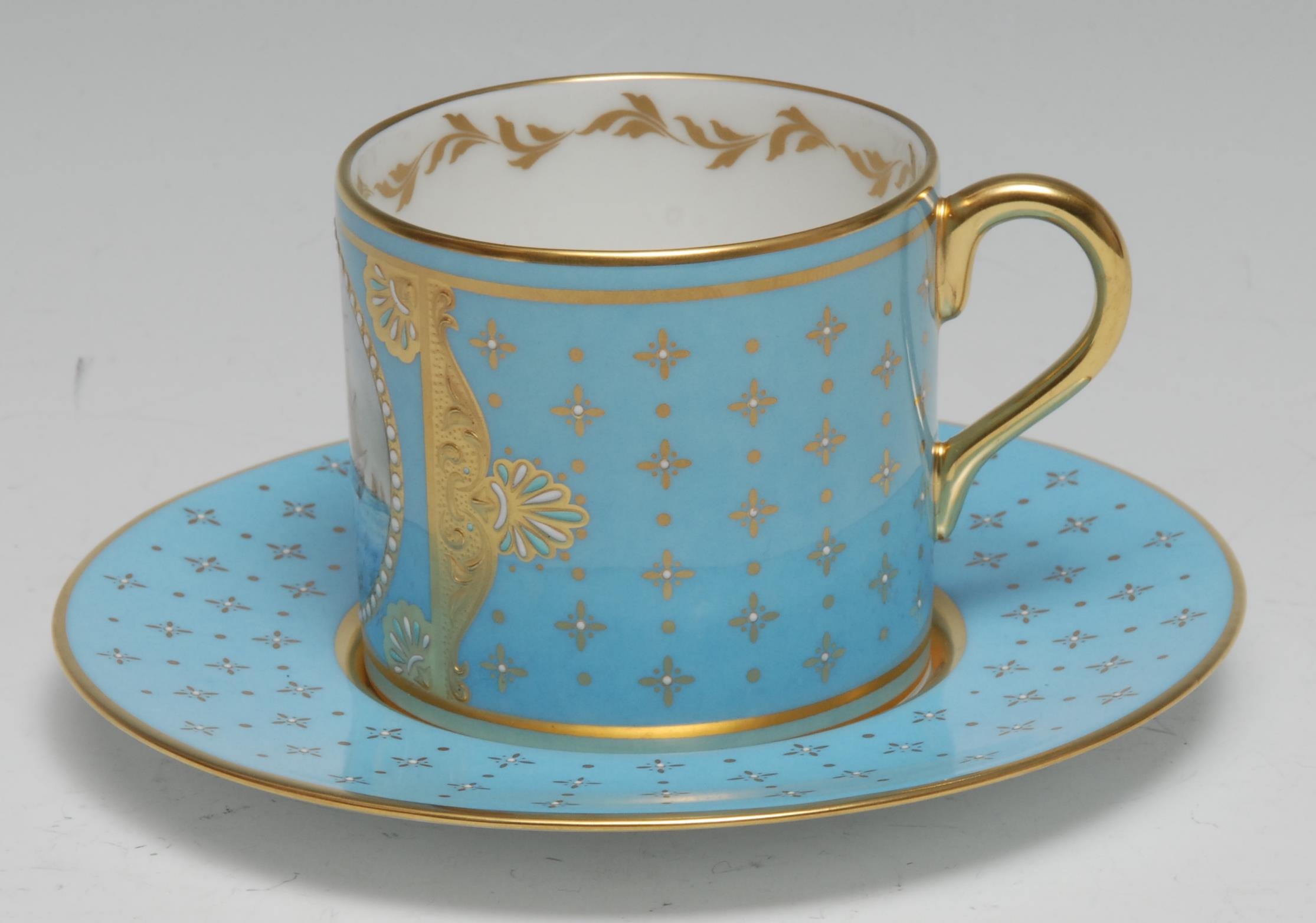 A Lynton porcelain coffee can and stand, painted by Stefan Nowacki, monogrammed, with a Dutch man- - Image 2 of 2