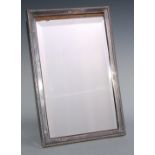 A Victorian silver rectangular easel dressing table mirror, lotus border, bevelled plate, 35.5cm