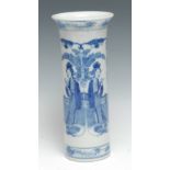 A 19th century Chinese cylindrical vase, decorated in underglaze blue with figures reading below