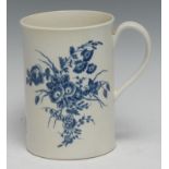 A Worcester cylindrical mug, decorated in underglaze blue with floral sprays, 14cm high, crescent