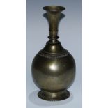 An Indian bronze surai rosewater flask, of Mughal bottle vase form, flared rim cast with a band of