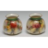 A pair of Hadley Worcester lobed ovoid vases, decorated with red and yellow cabbage roses, 8cm high,