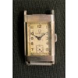 Omega - an Art Deco tank cased wristwatch head, textured rectangular dial, Arabic numerals, minute