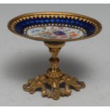 A 19th century French gilt-metal mounted Limoges enamel miniature cabinet comport, painted with