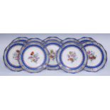 A set of ten Berlin porcelain cabinet plates, each individually painted with bouquets of Duchem