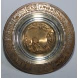 A South African parcel-gilt silver circular dish, the field with lion, elephant, rhinoceros and
