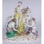 A Meissen group of Europa and the bull after J. J. Kändler, her flower attendants similarly semi