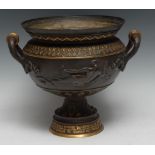 A 19th century Grecian Revival gilt and brown-patinated Campagna urn, cast in bold relief with