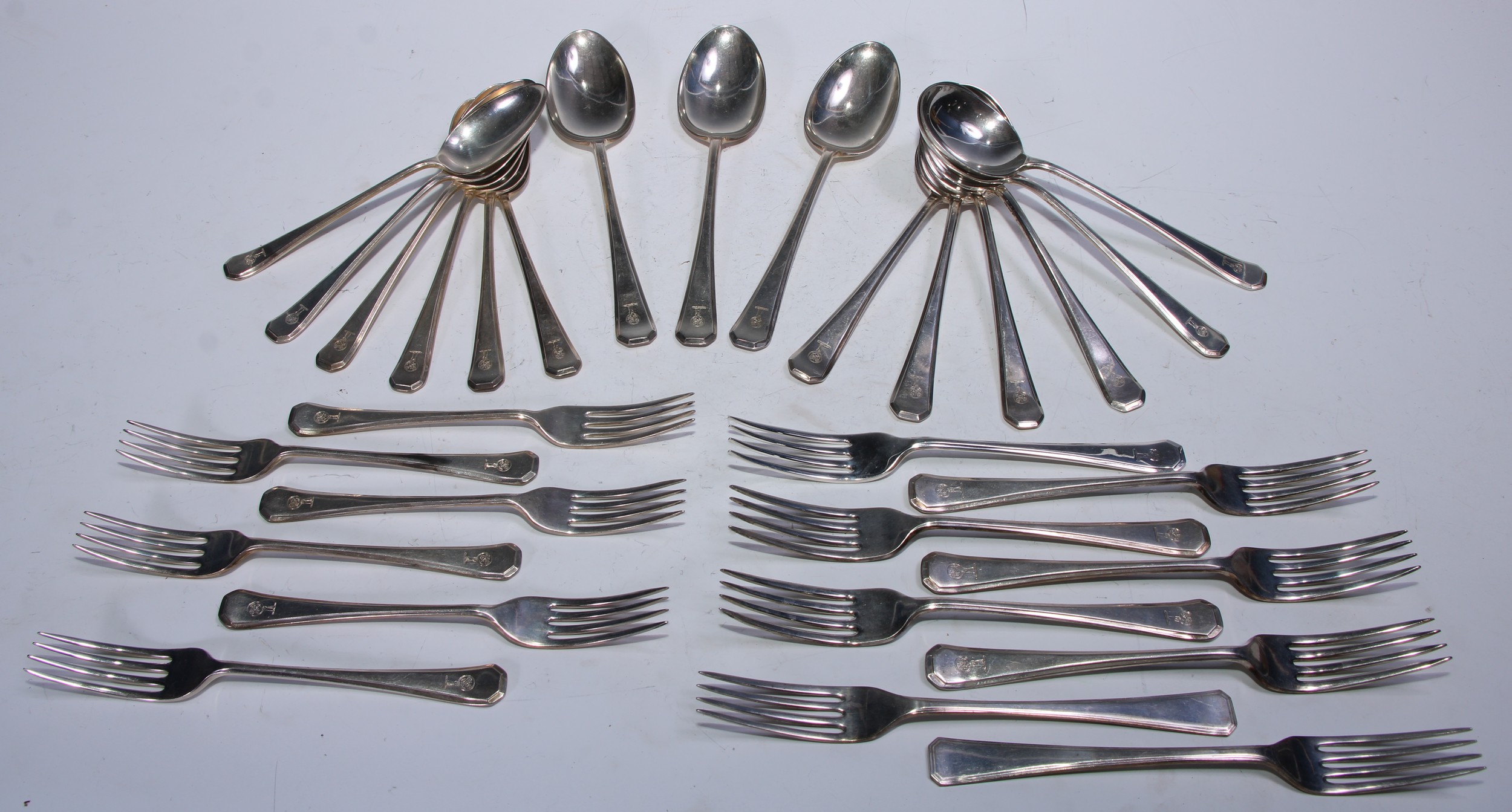 A George V silver canteen, comprising six table forks, six dessert forks, six soup spoons, six