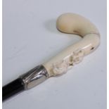 A late 19th century German gentleman's novelty marine ivory and horn walking stick, the club-