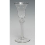 An early George III air twist wine glass, bell shaped bowl, knopped double-helix stem, domed foot,