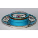 A Sèvres circular gilt metal mounted encrier cover and stand, painted with summer flowers in