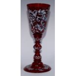 A 19th century Bohemian ruby glass wunderkammer pedestal goblet, painted in polychrome enamels