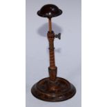 A Regency penwork wig stand, painted with garlands of laurels, vine leaves and further foliage,