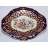 A Sevres lobed navette shaped cabinet tray, painted to centre with an oval crowned portrait of Louis